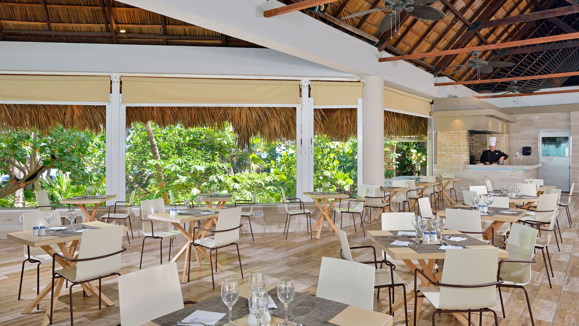 a room with tables and chairs