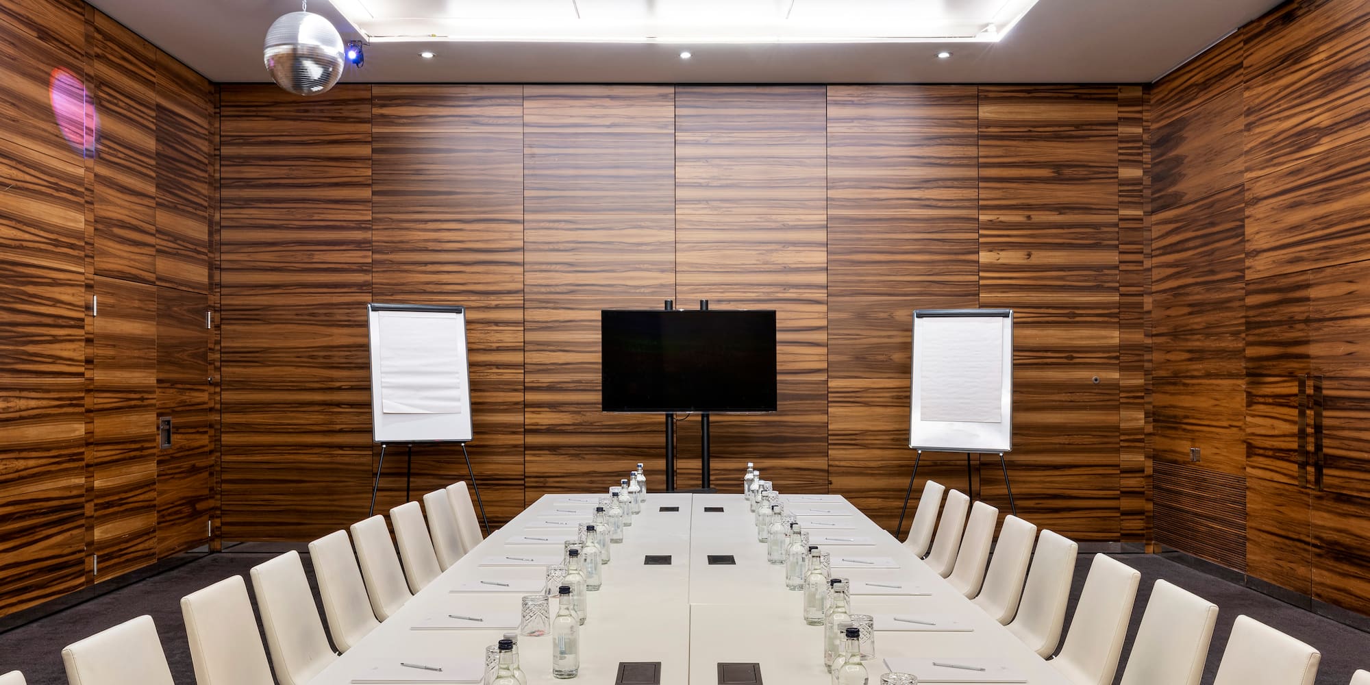 a room with a table and chairs