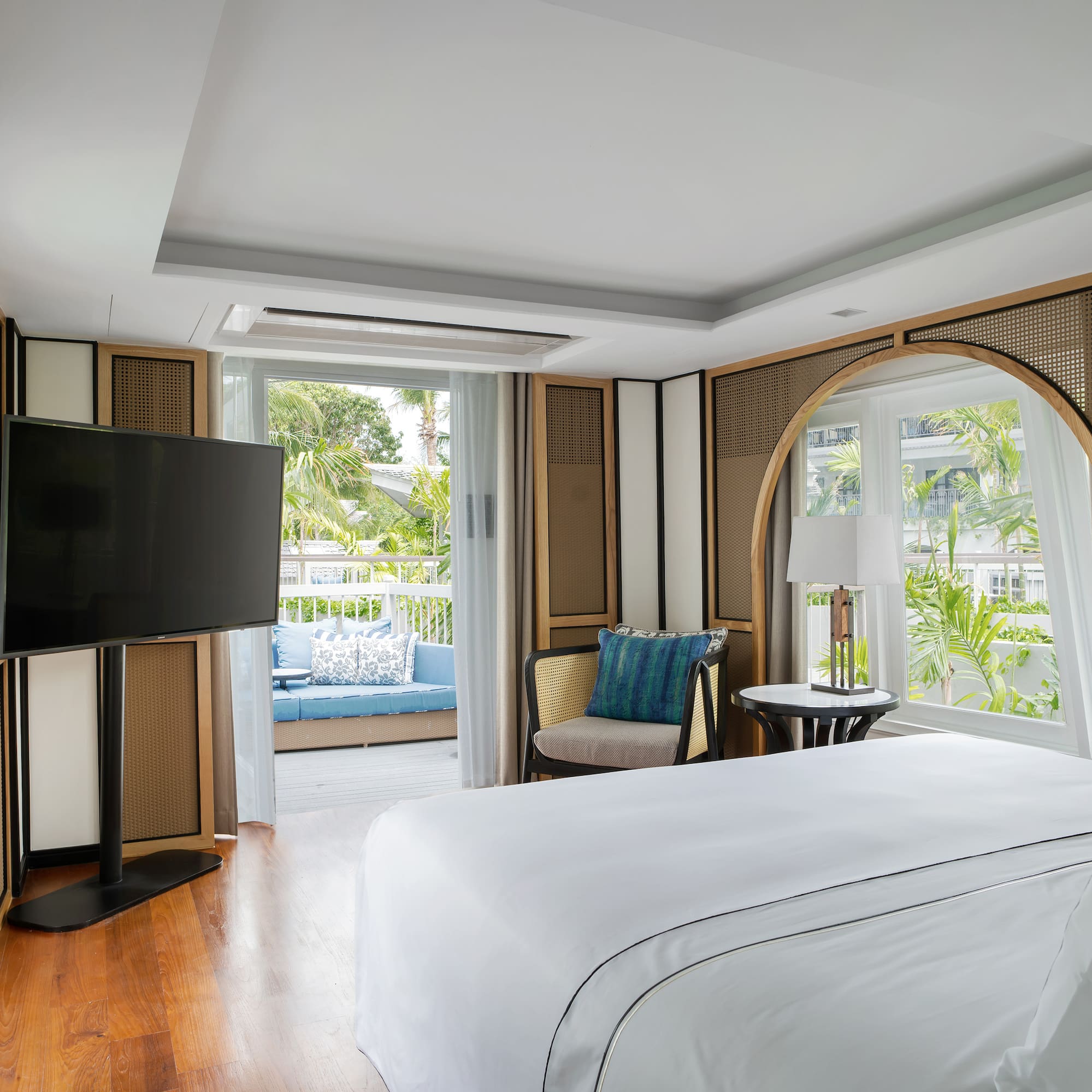 a room with a television and a bed