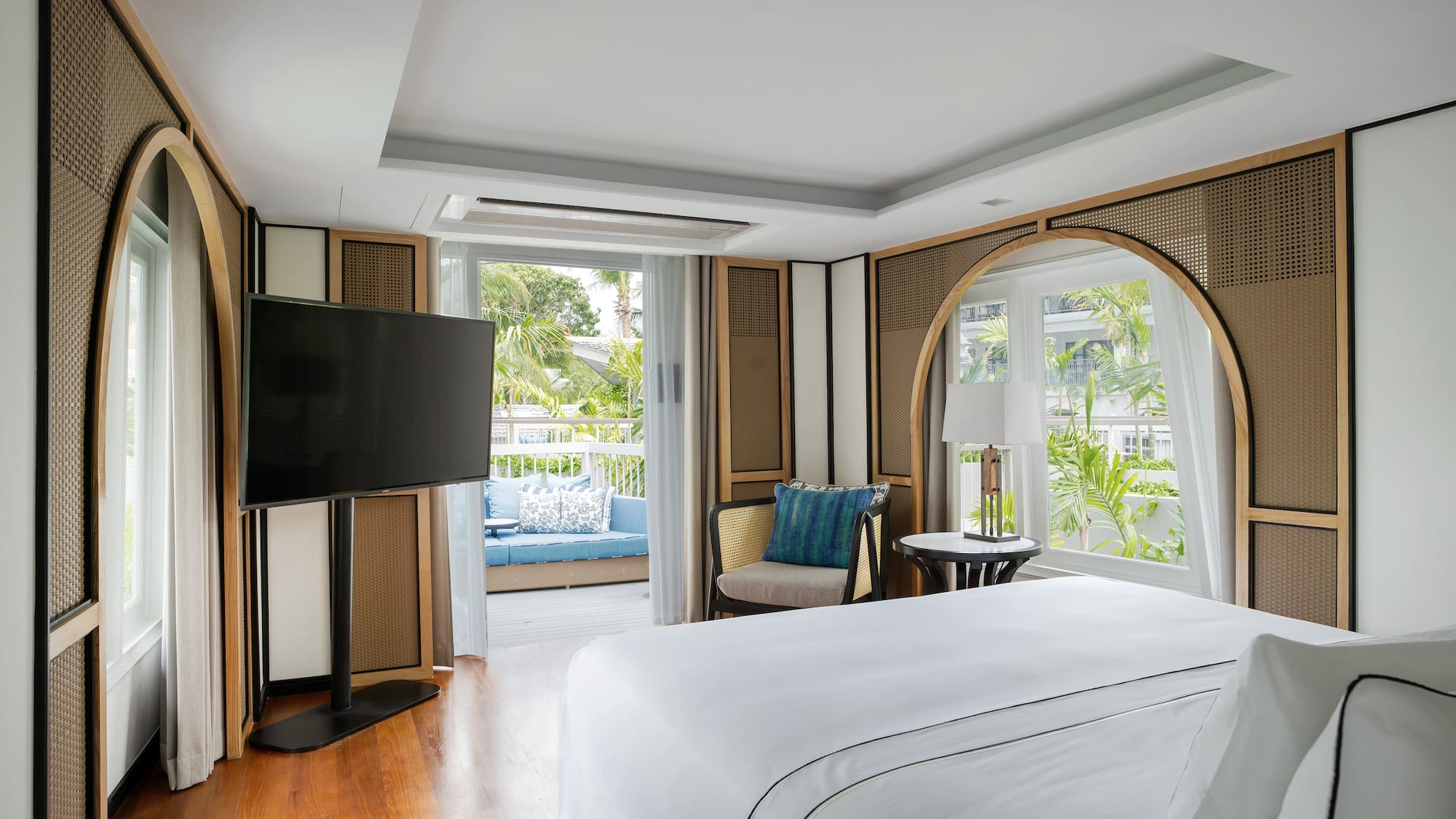 a room with a television and a bed