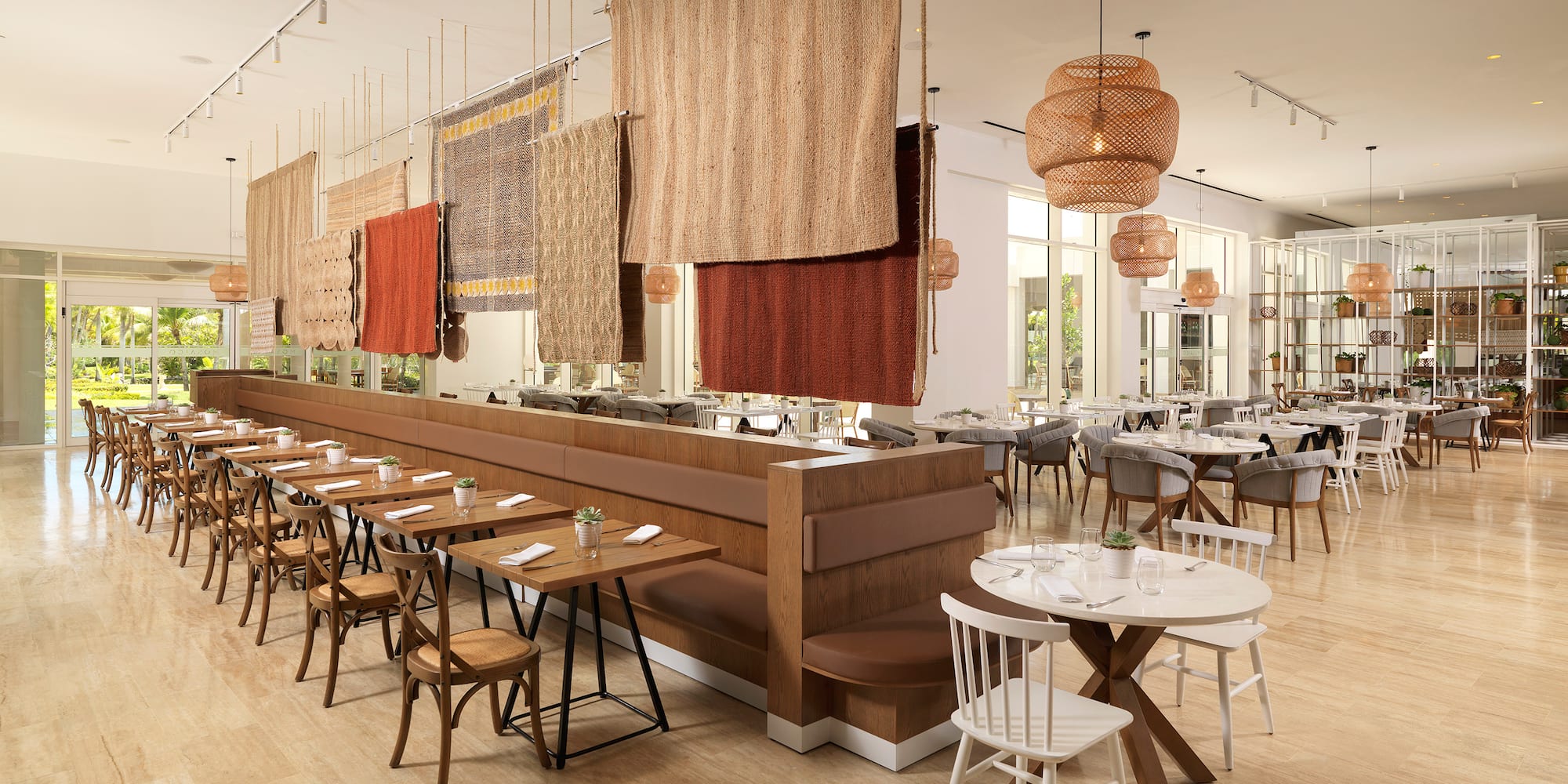 a restaurant with tables and chairs