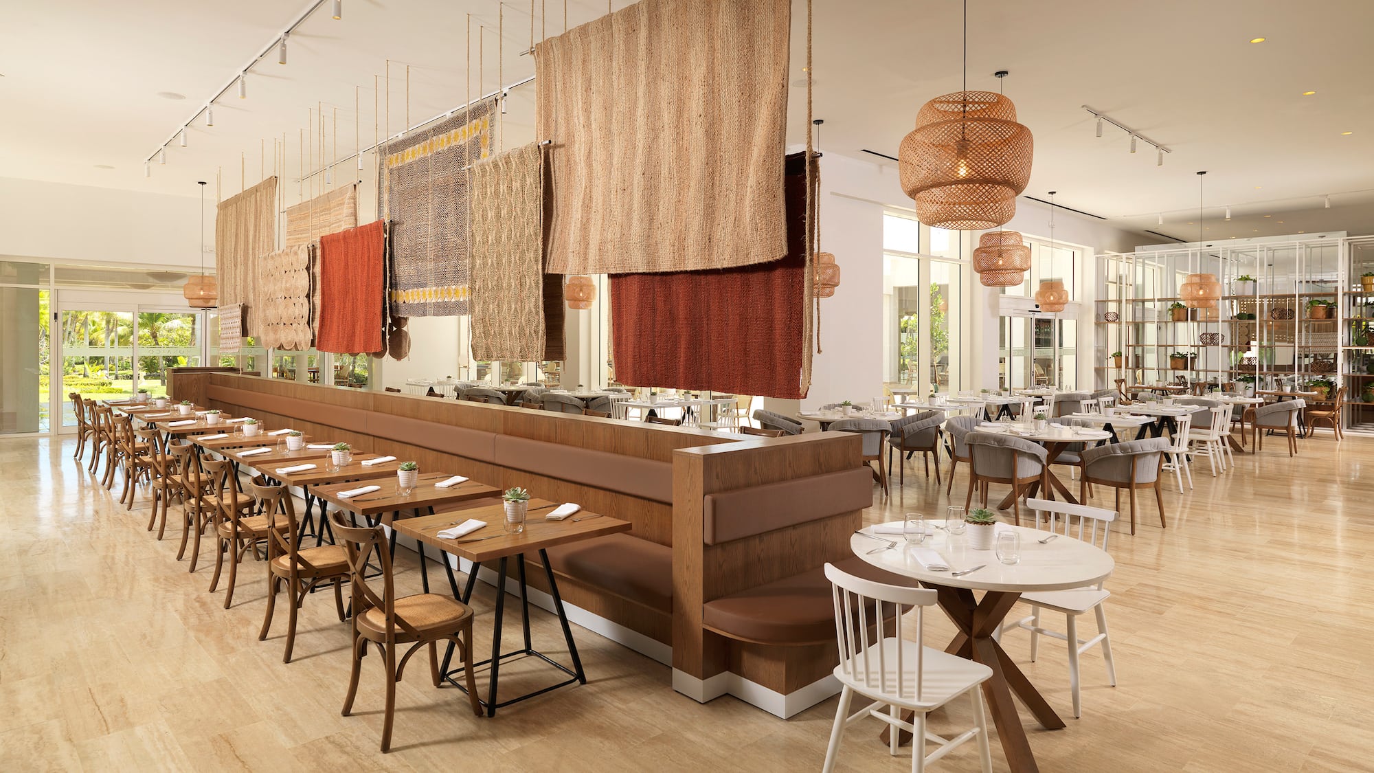 a restaurant with tables and chairs