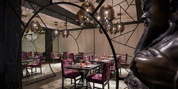 a room with tables and chairs