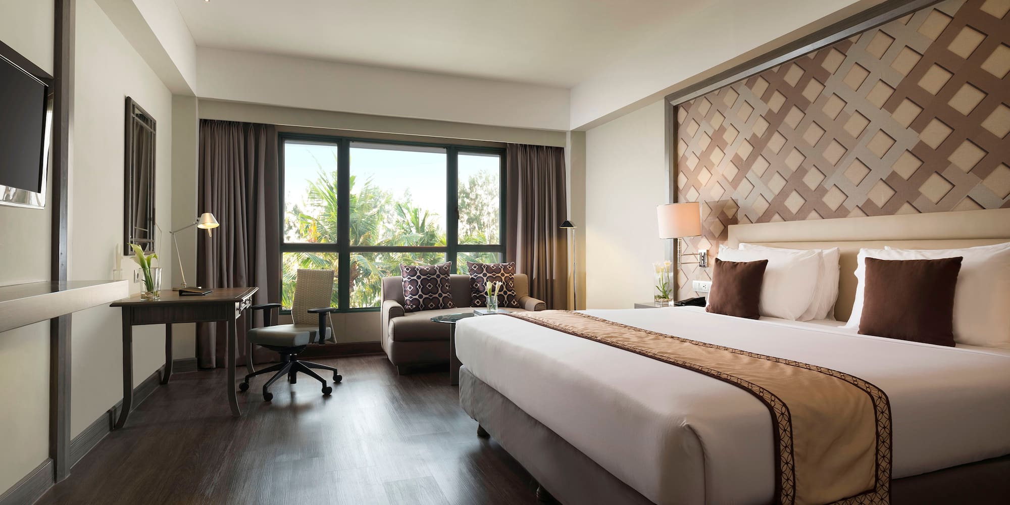 a room with a bed and a chair