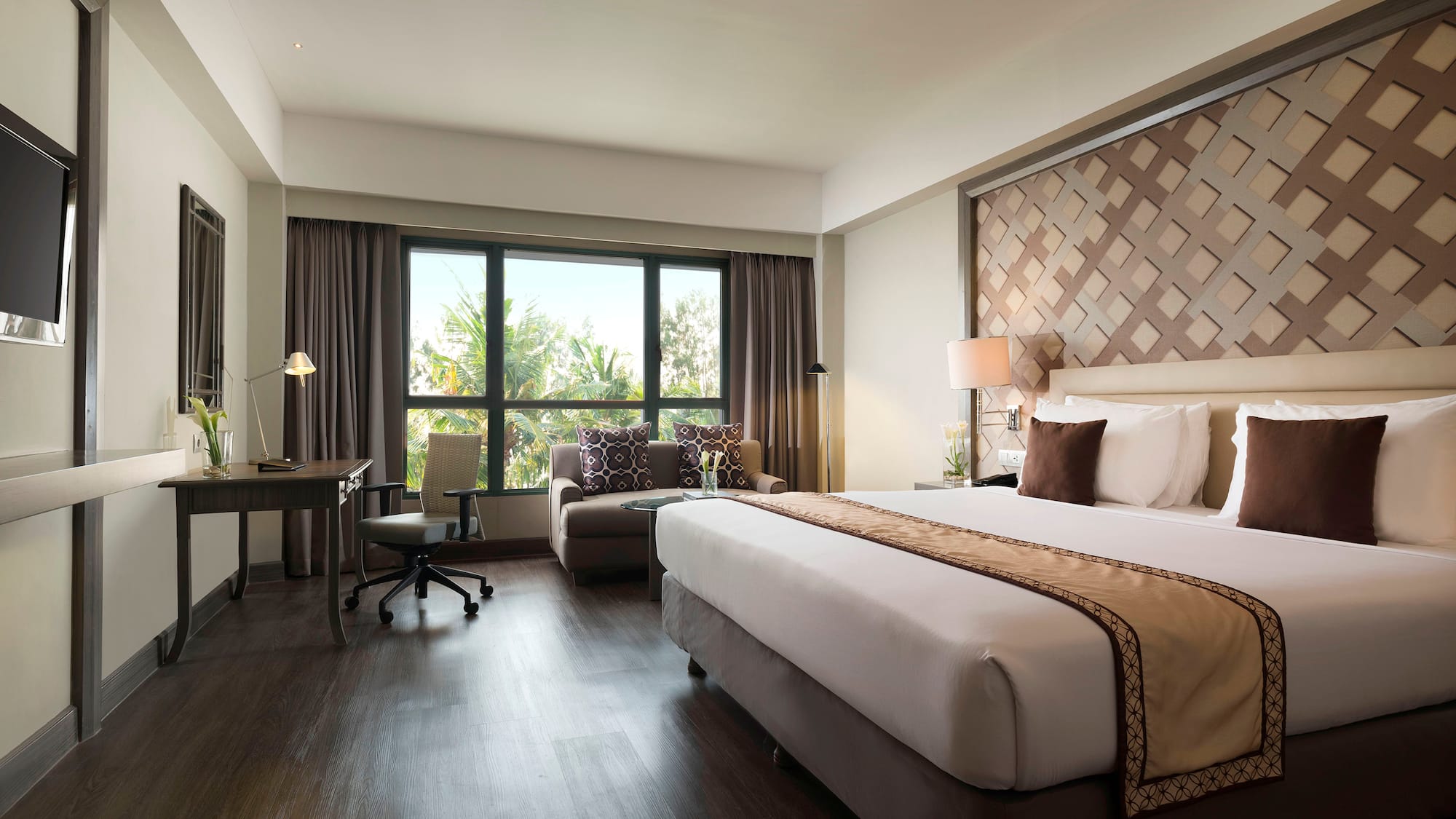 a room with a bed and a chair