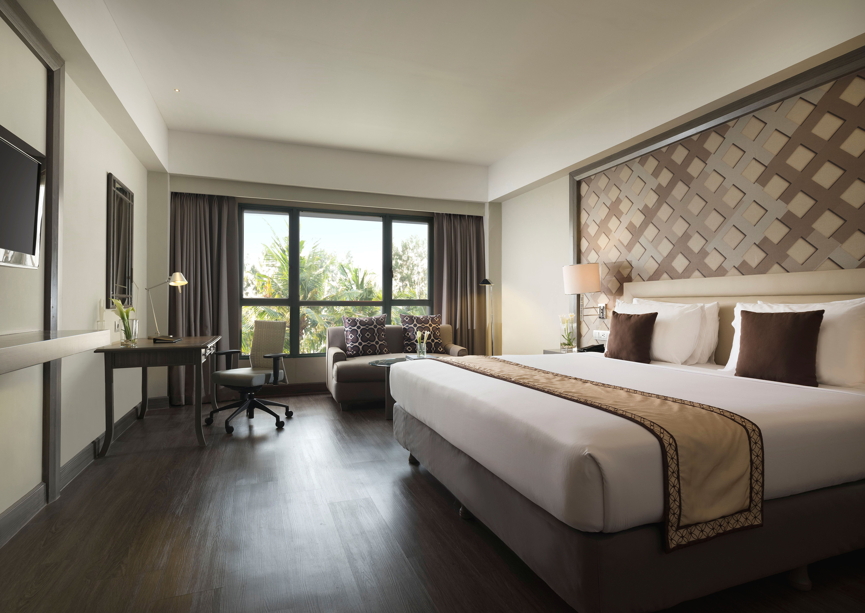 a room with a bed and a chair