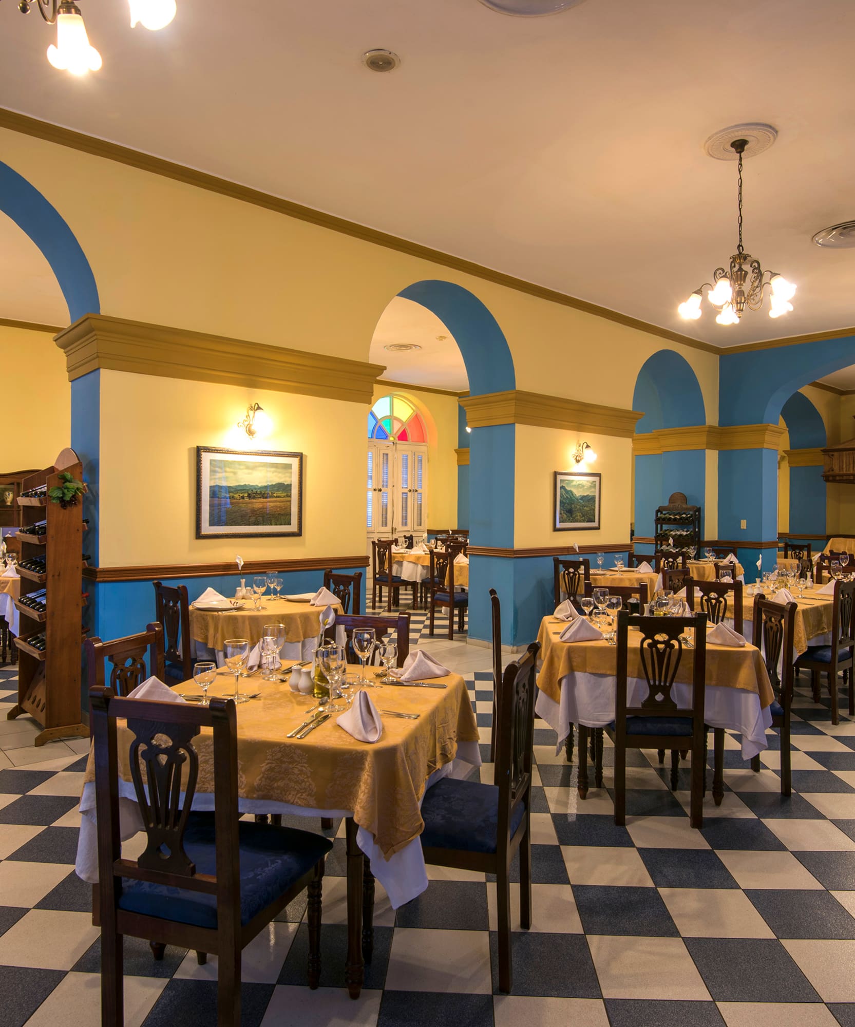 a room with tables and chairs