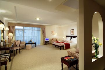 a room with a television and a bed