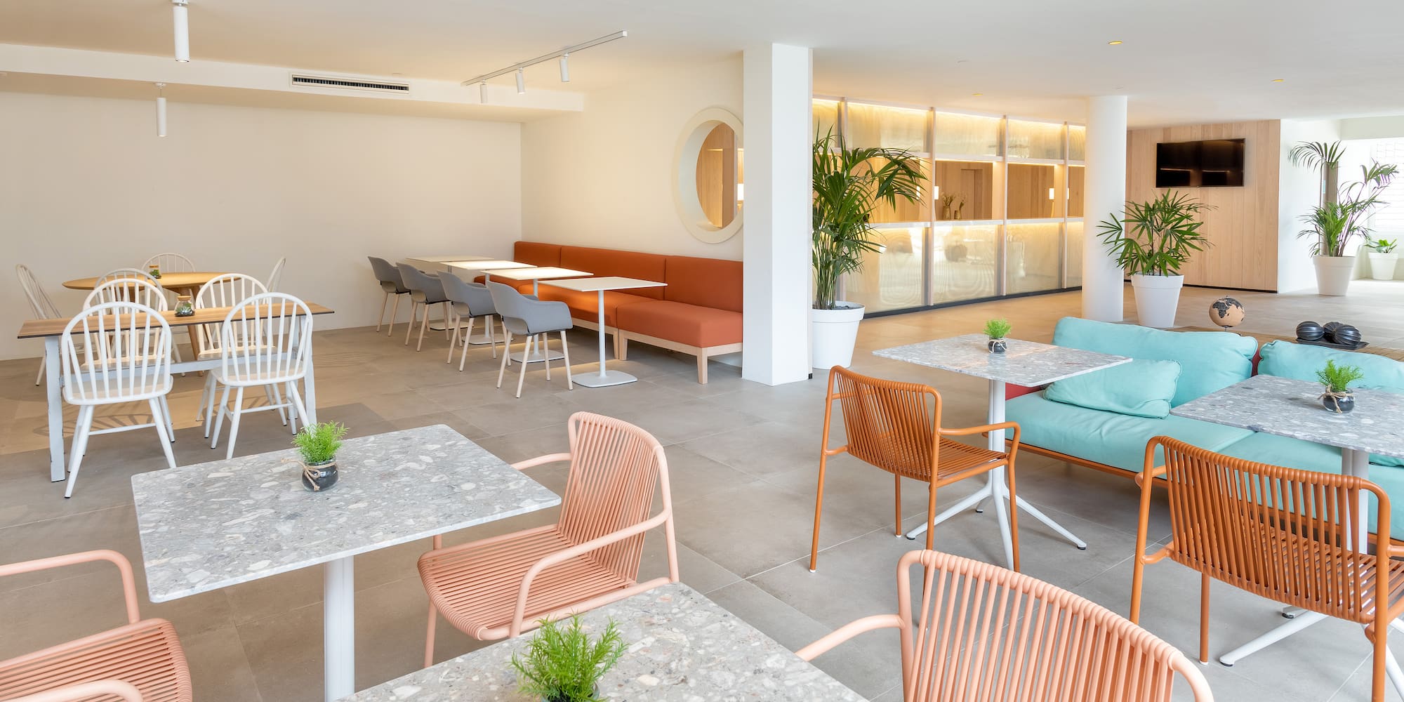 a room with tables and chairs