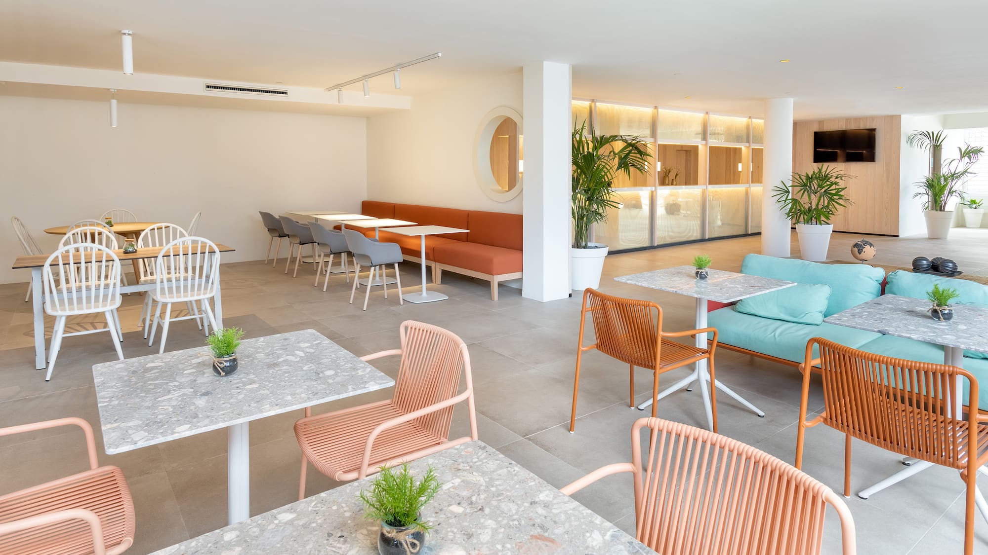 a room with tables and chairs