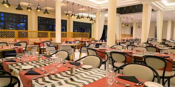 a room with tables and chairs