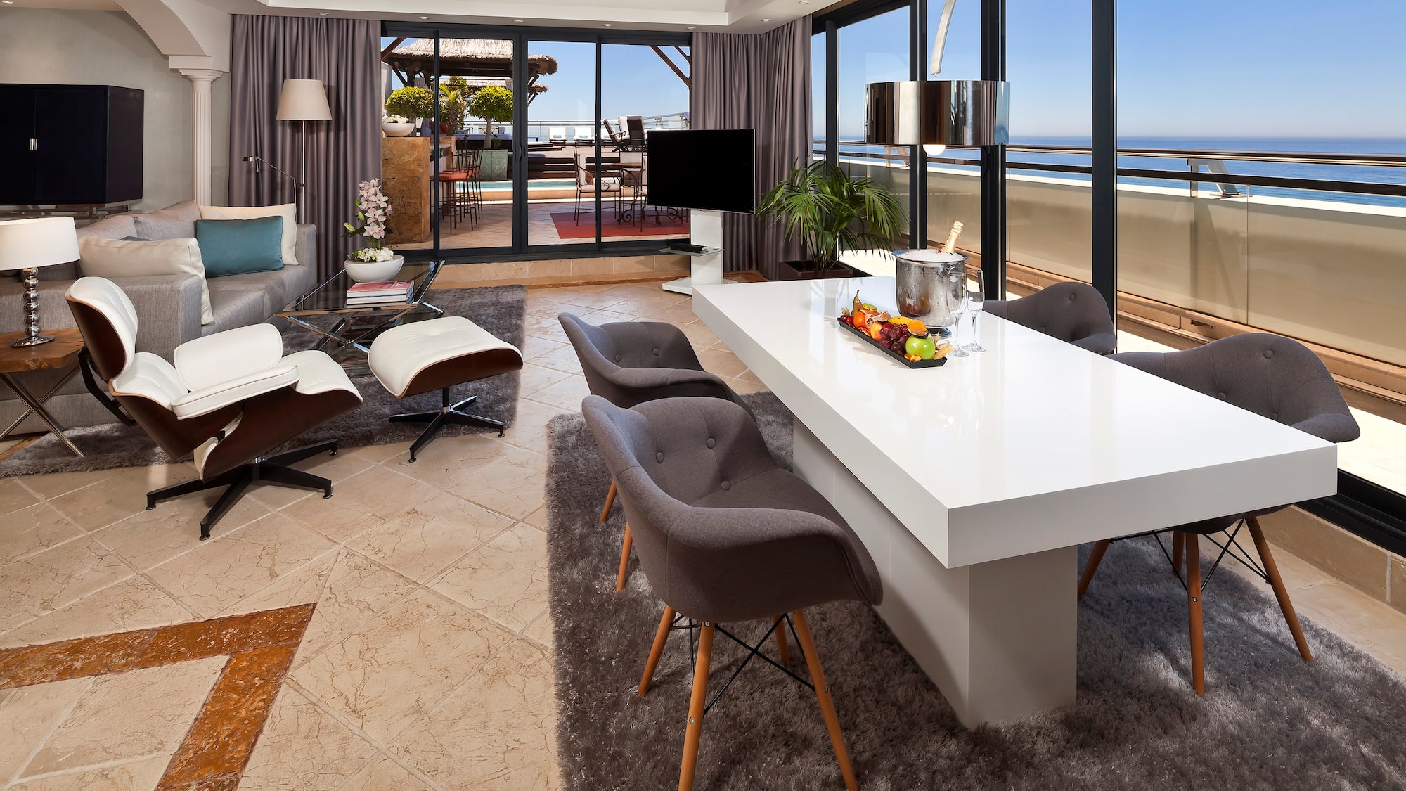 a room with a large table and chairs