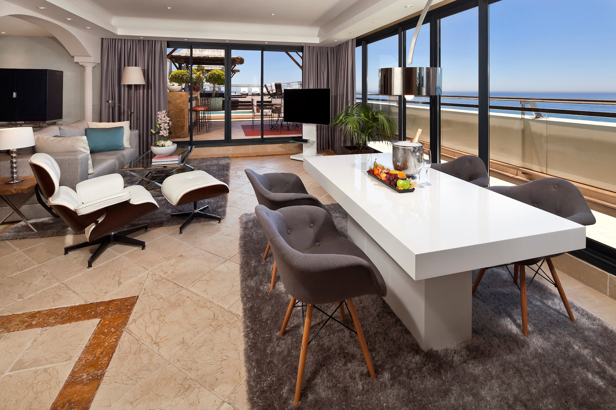 a room with a large table and chairs