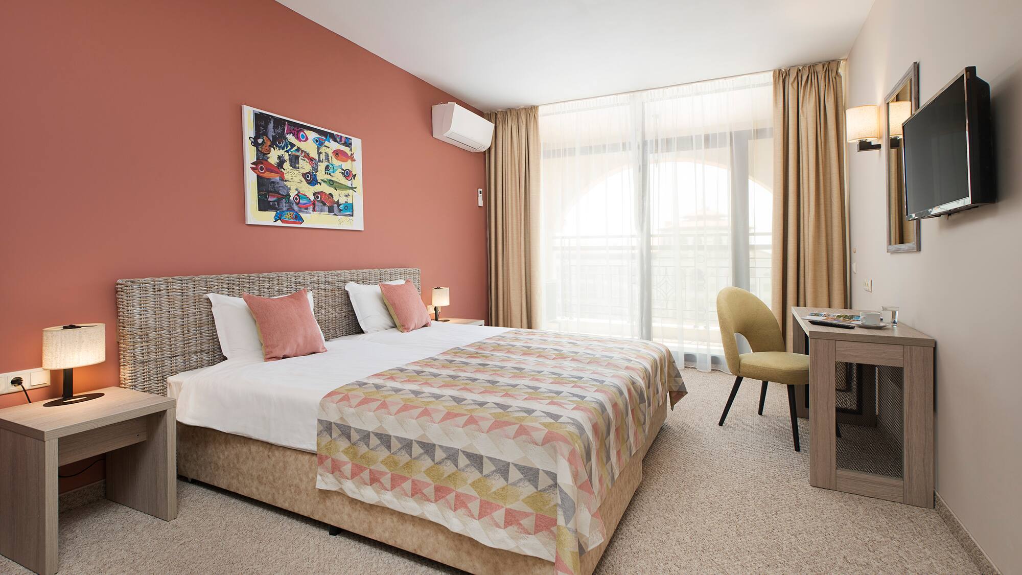 a bedroom with a bed and a desk