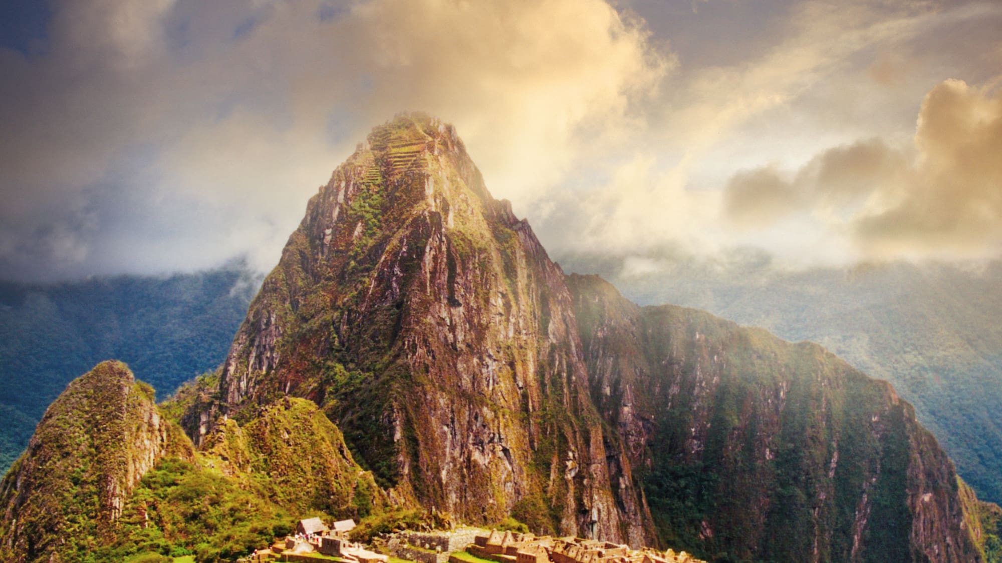 a stone ruins on a mountain