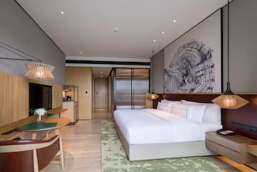 a room with a bed and a desk
