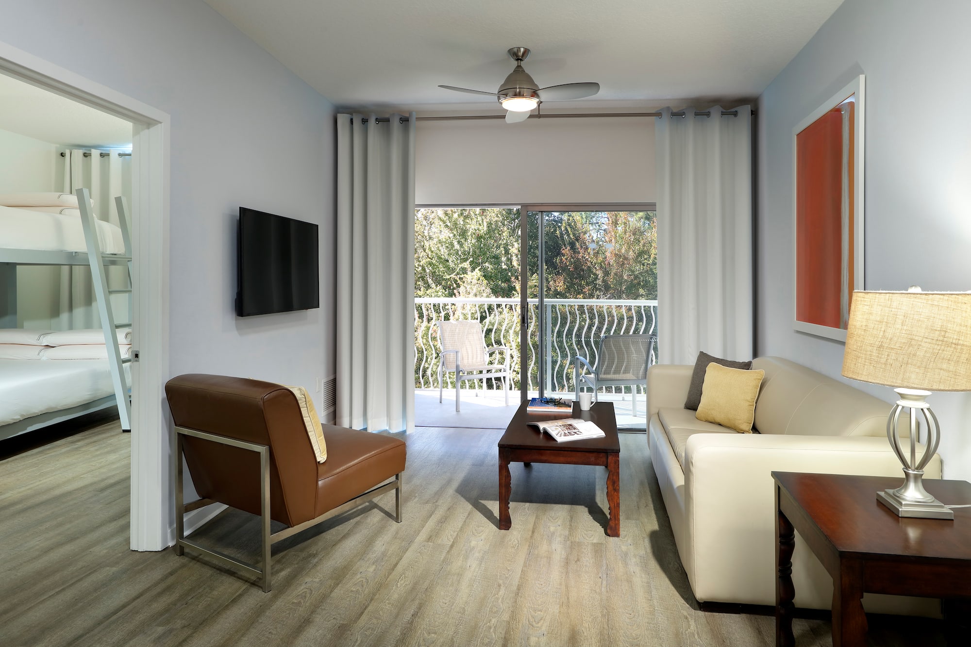 a living room with a television and couches