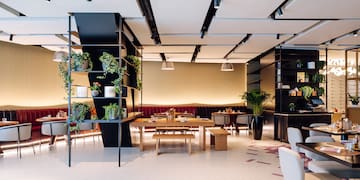 a room with a table and chairs