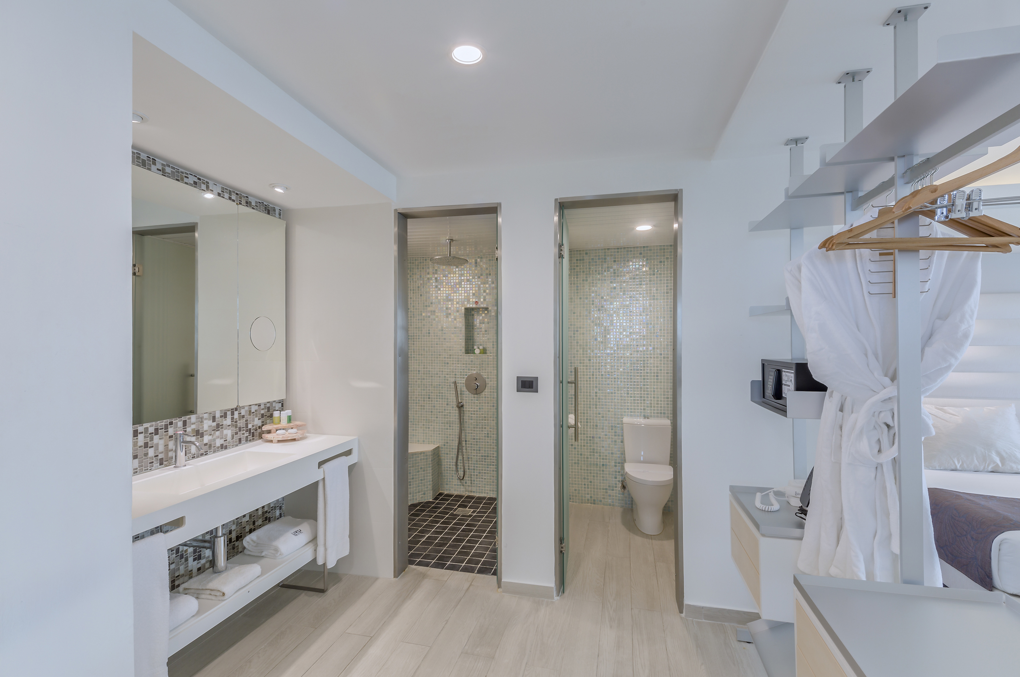 a bathroom with a shower and a toilet
