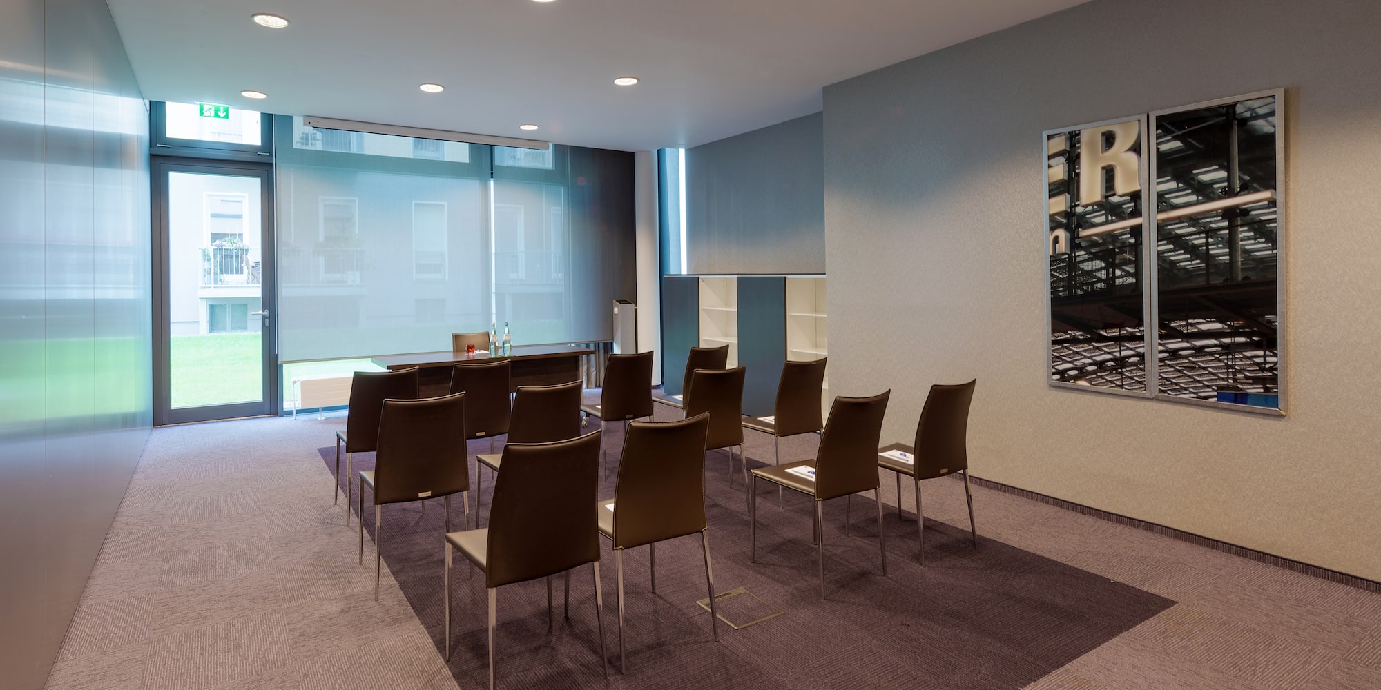 a room with chairs and a table