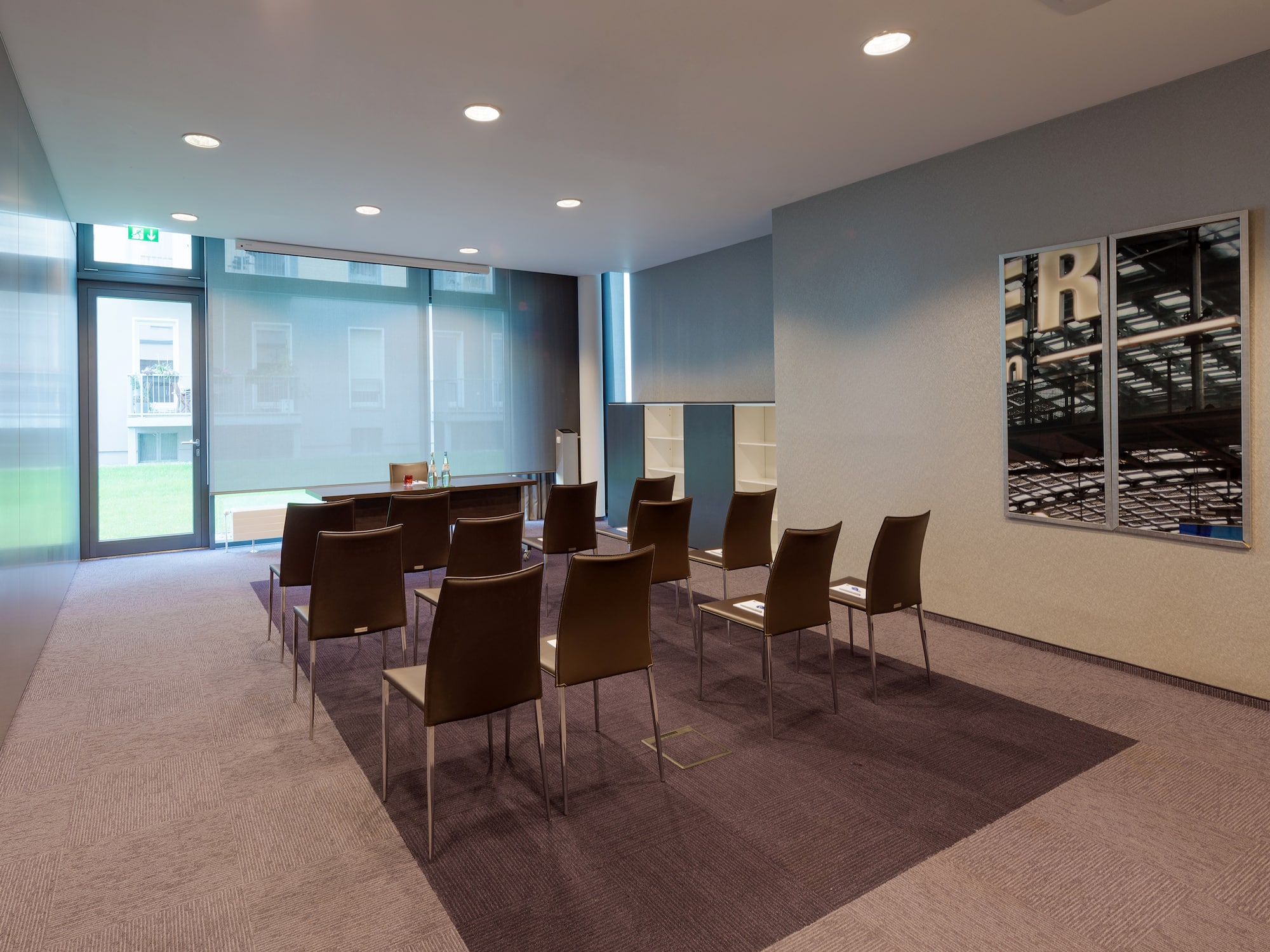 a room with chairs and a table