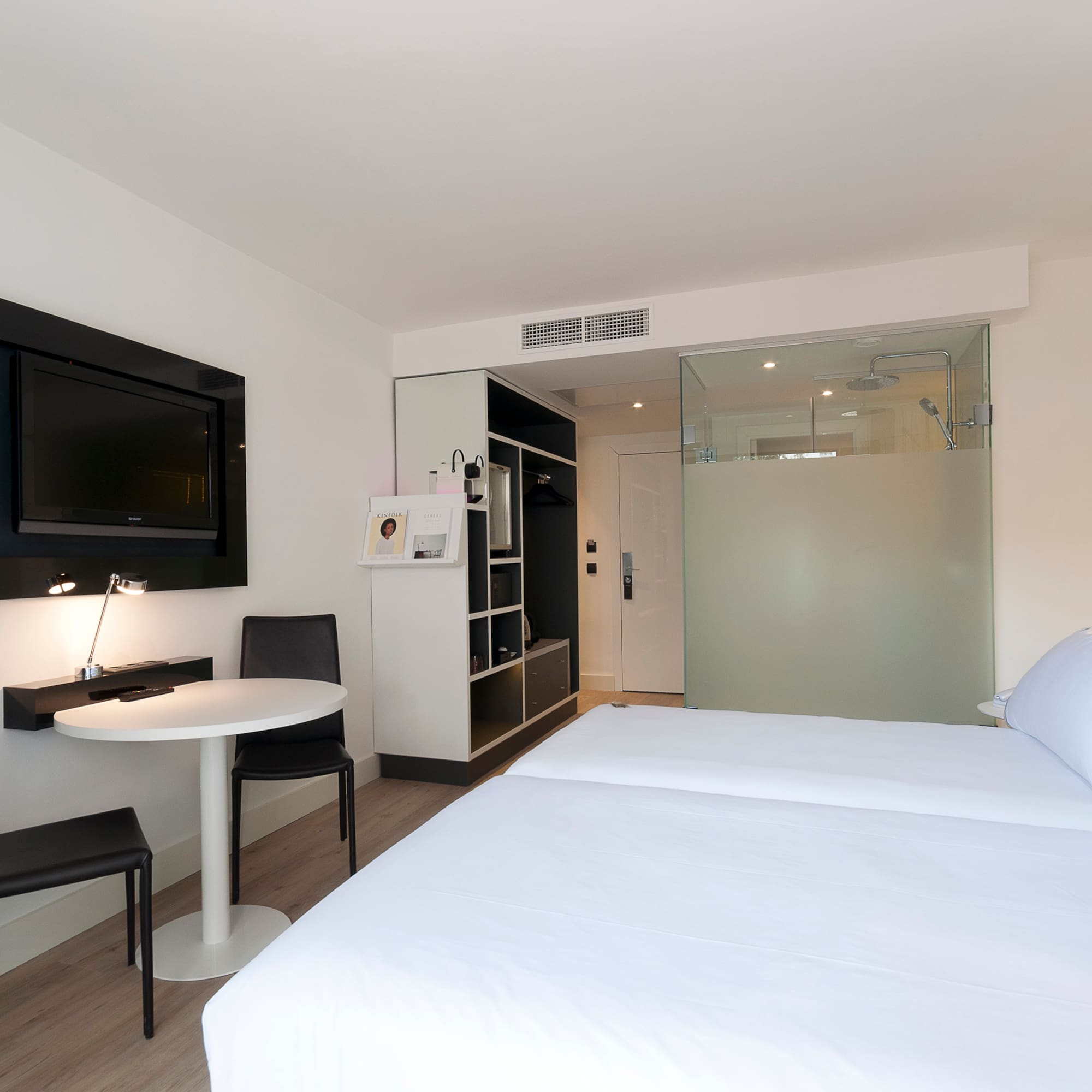 a room with a bed and a table