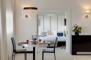 a room with a table and chairs
