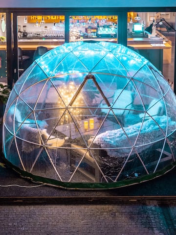 a glass dome with a blue light inside