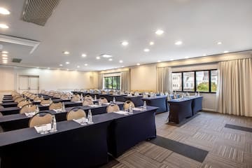 a room with tables and chairs