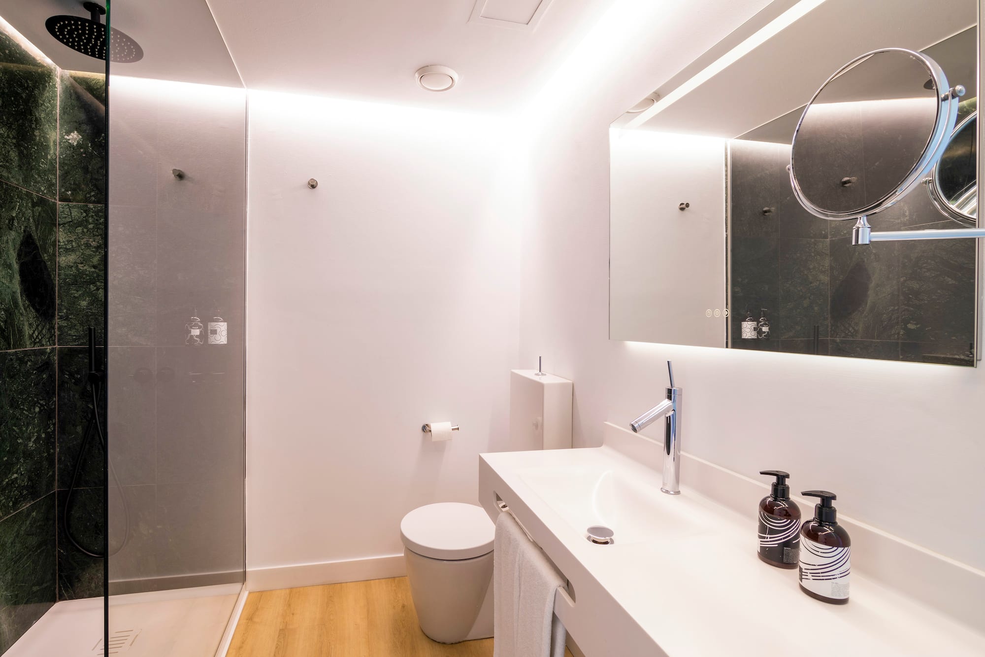 a bathroom with a mirror and sink