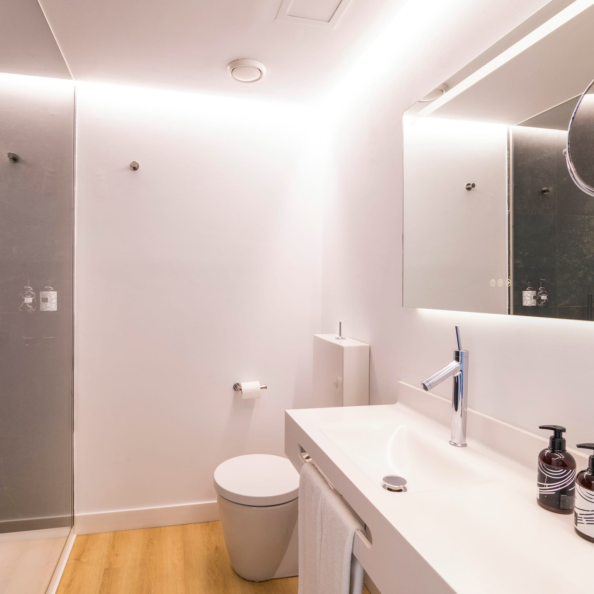 a bathroom with a mirror and sink