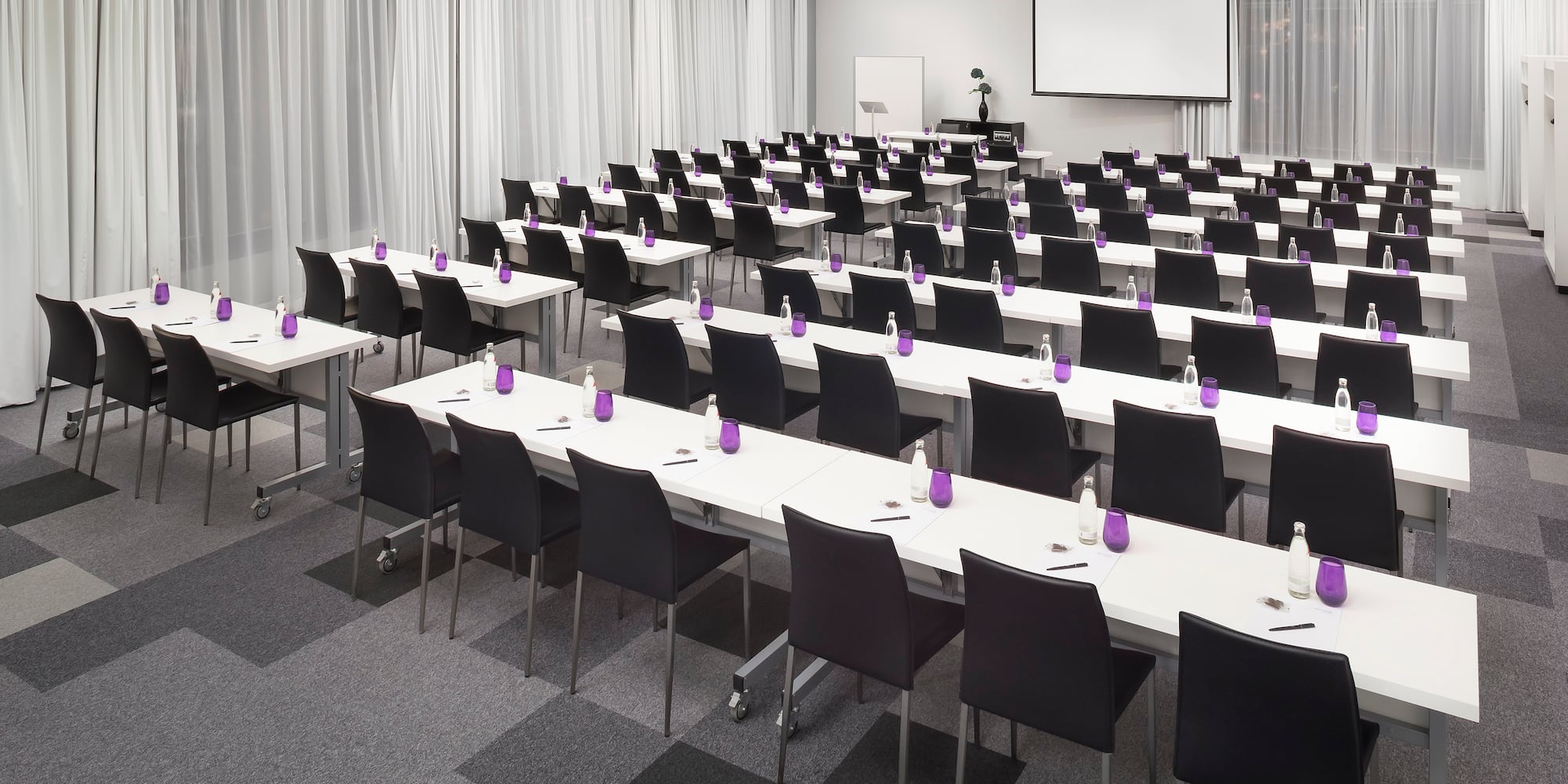 a room with tables and chairs