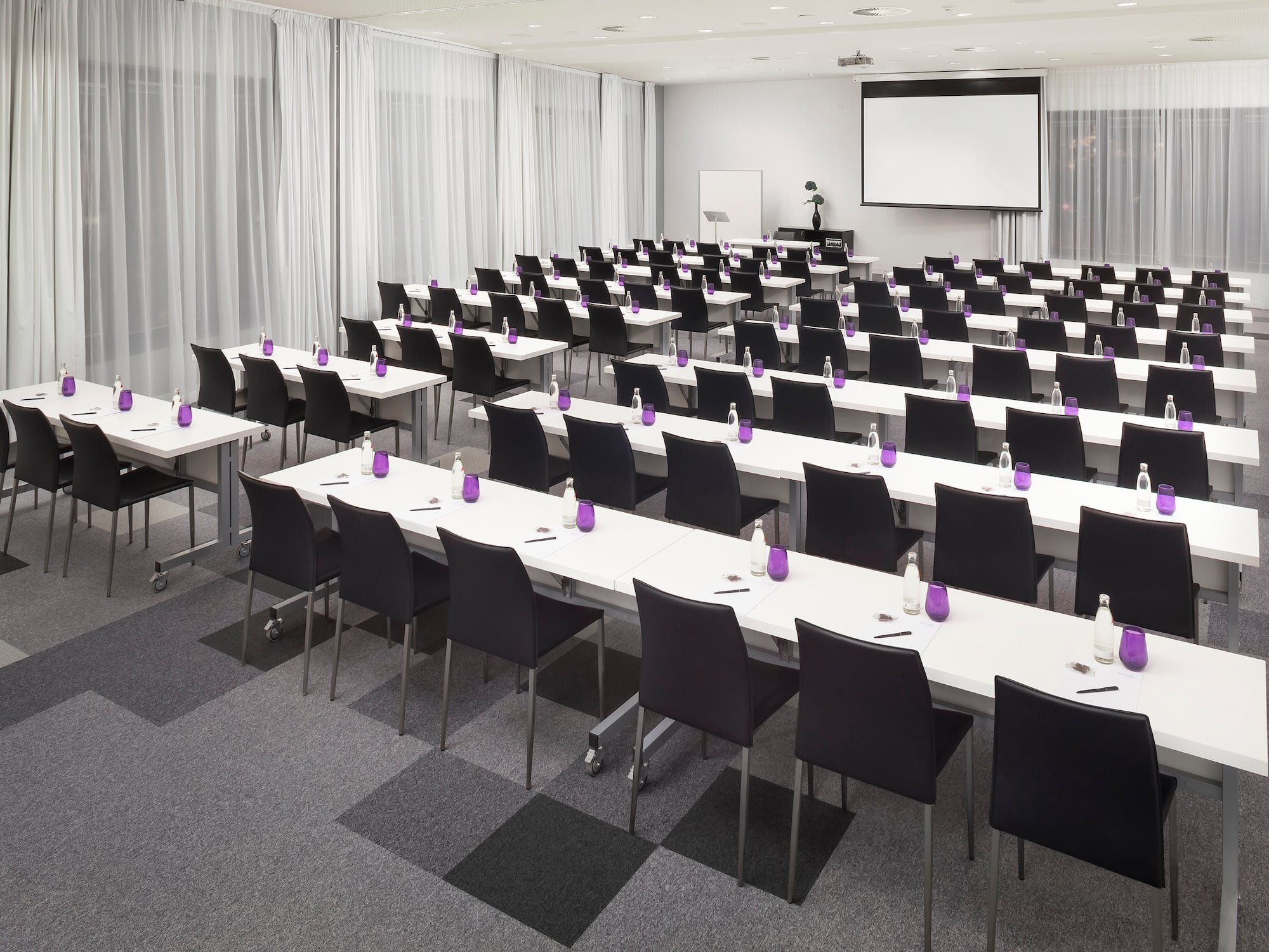 a room with tables and chairs