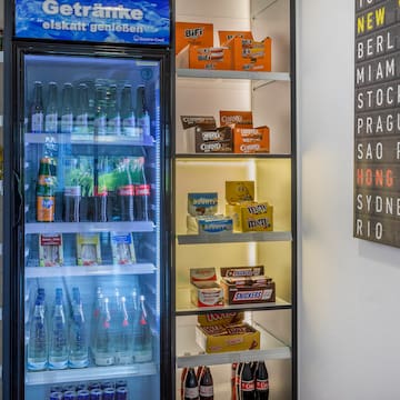 a refrigerator with drinks and snacks