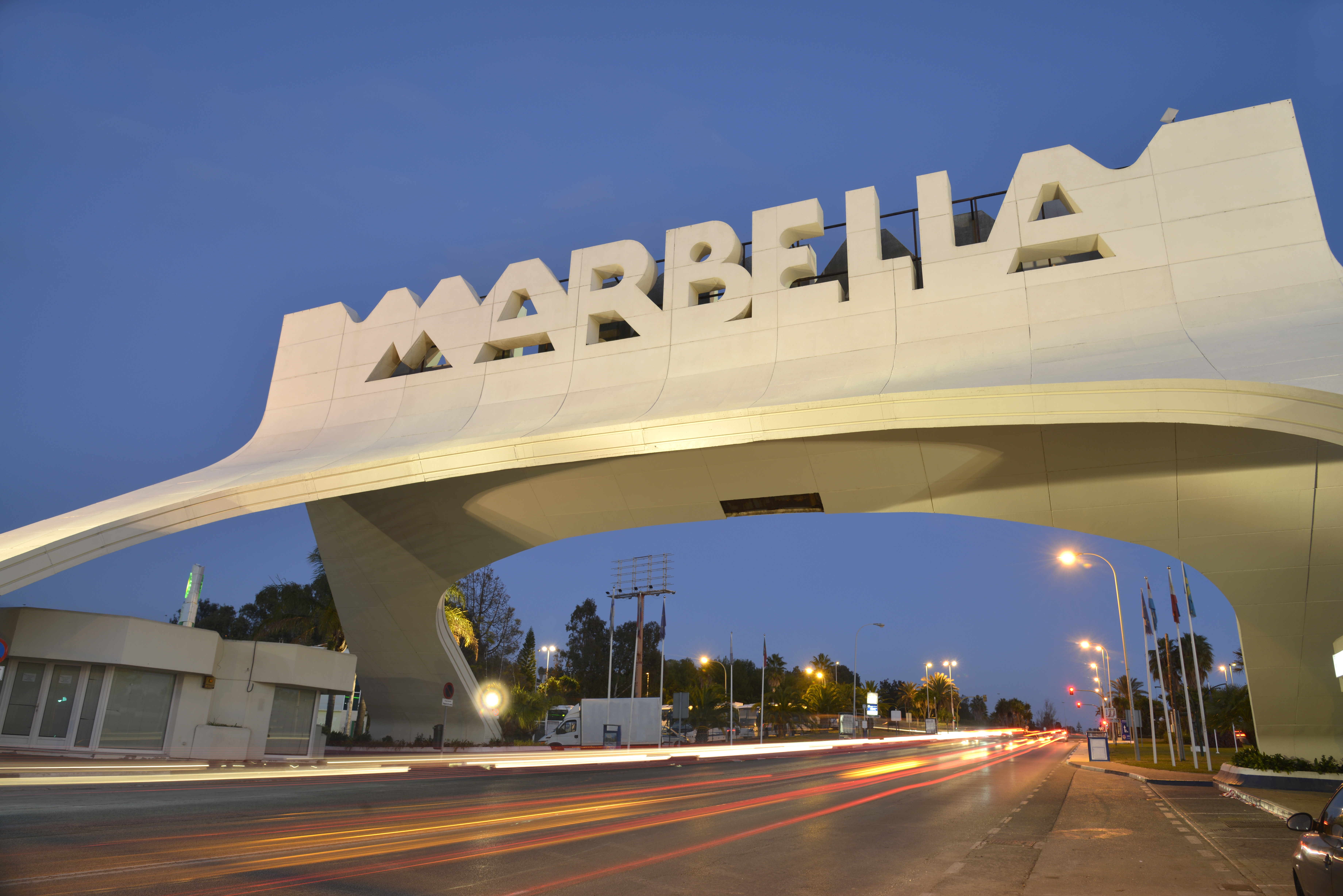 a white bridge over a road