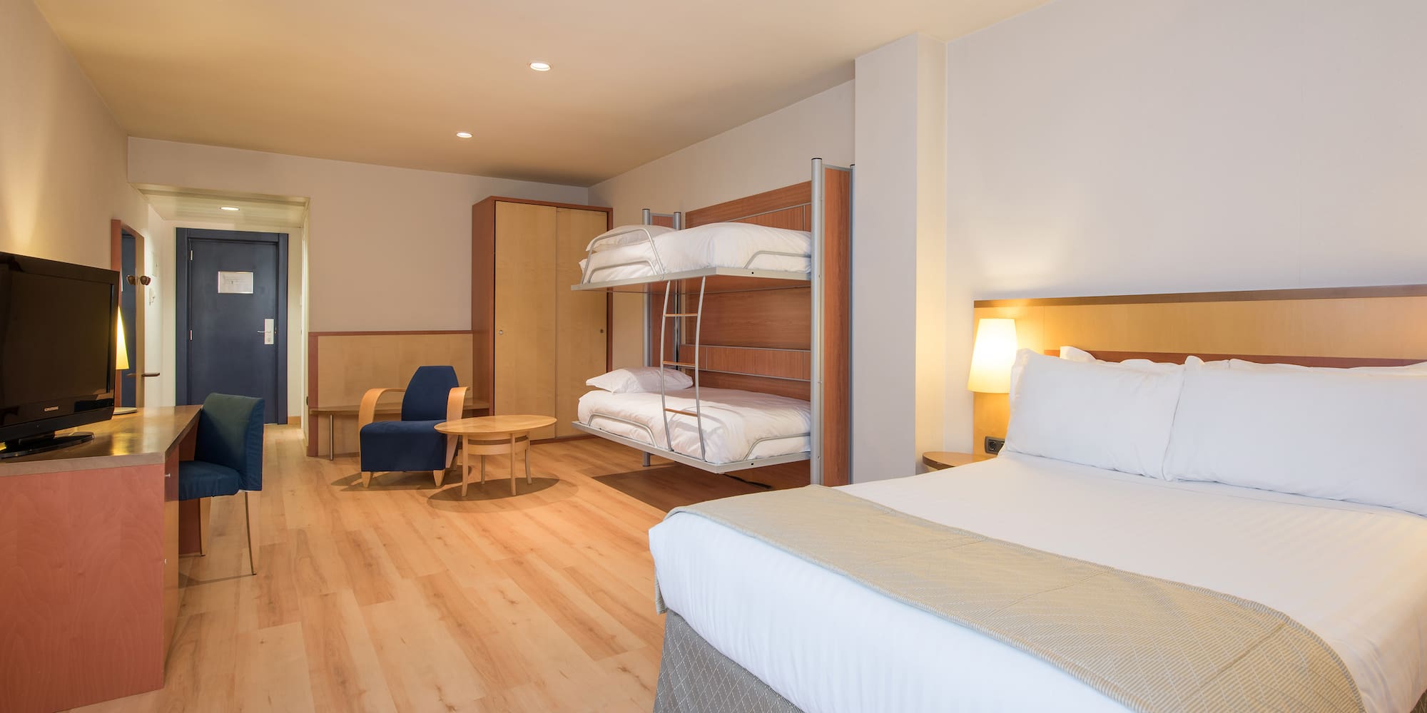 a room with a bed and a chair