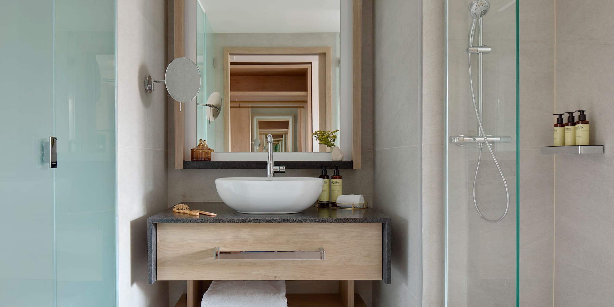 a bathroom with a mirror and sink