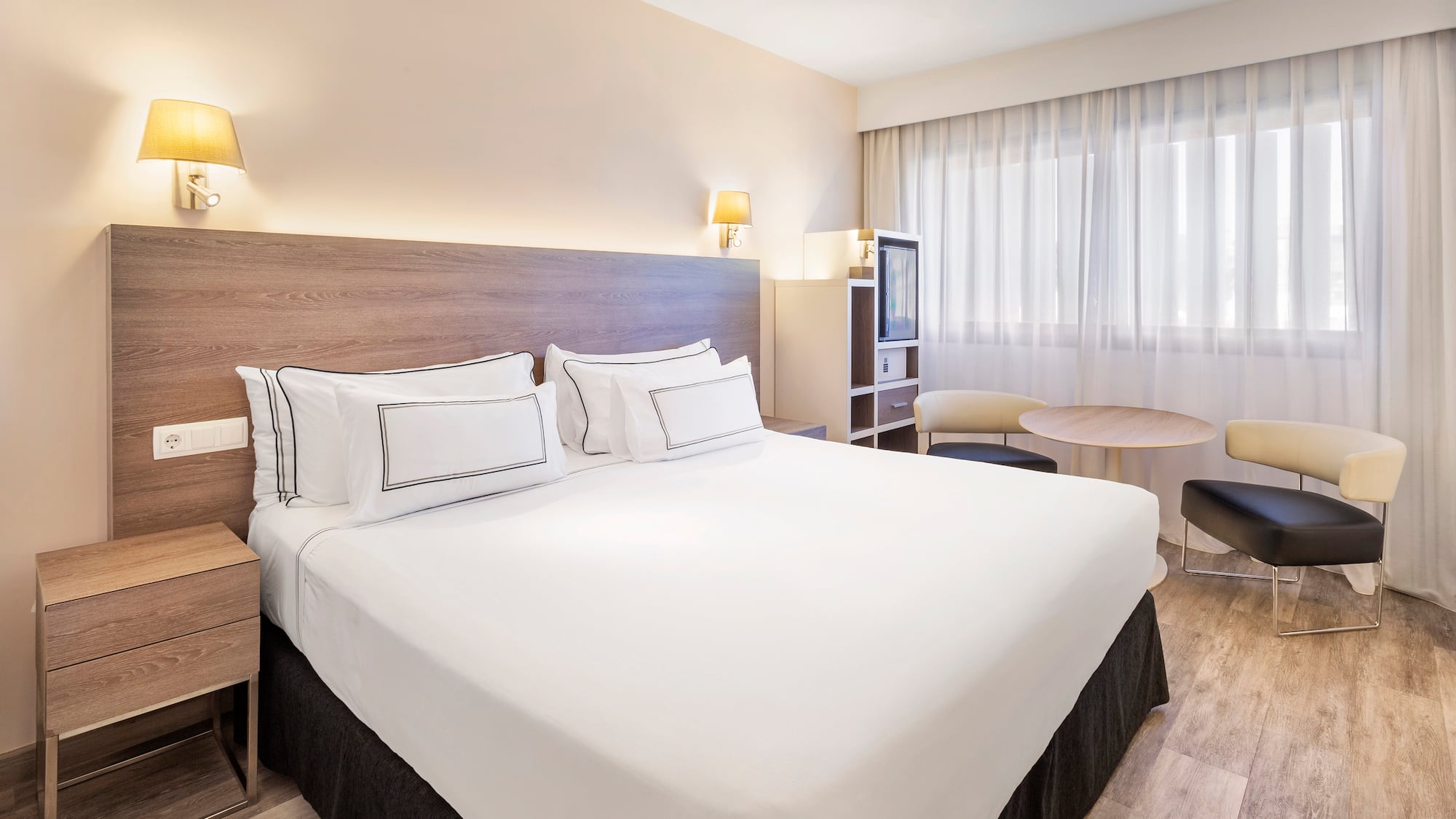 a room with a bed and a table