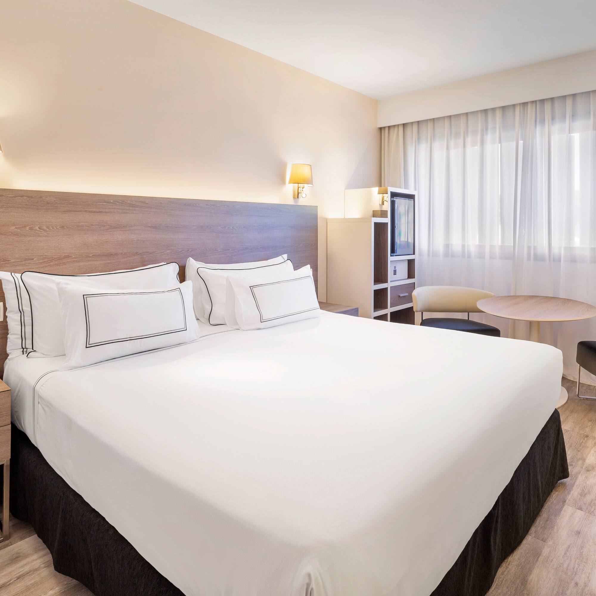 a room with a bed and a table