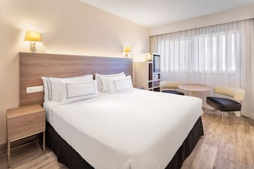 a room with a bed and a table