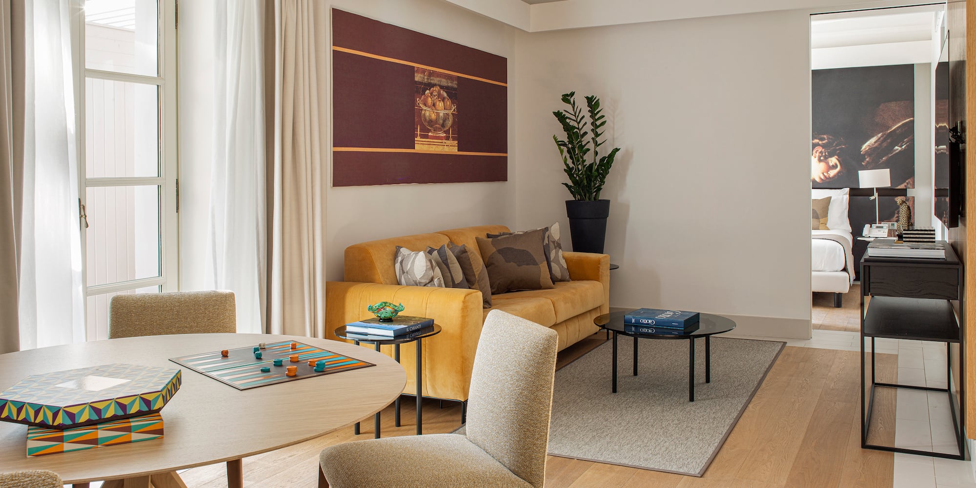 a living room with a couch and a table