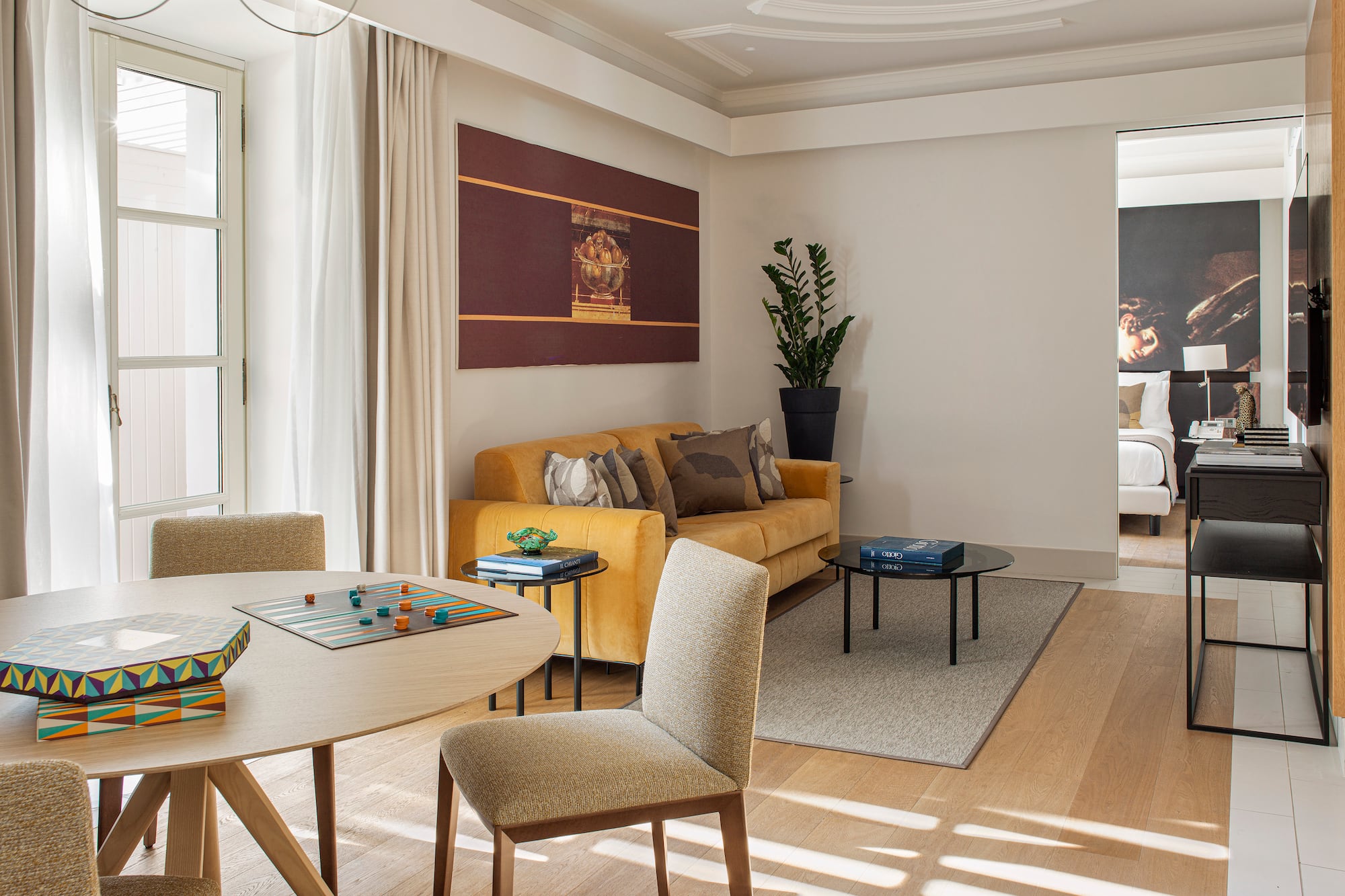 a living room with a couch and a table