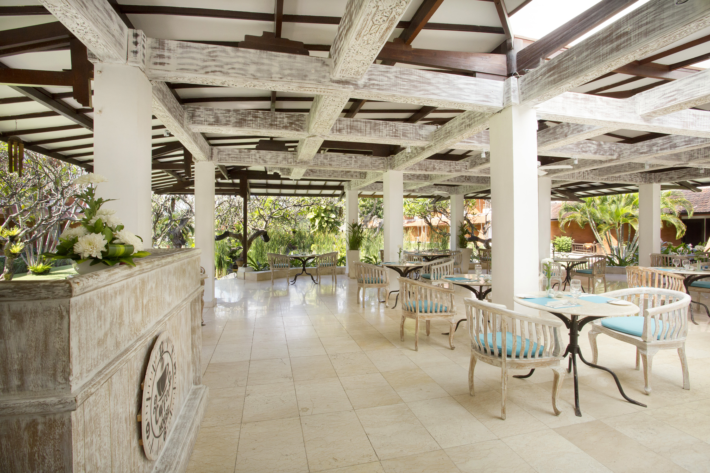 a room with tables and chairs