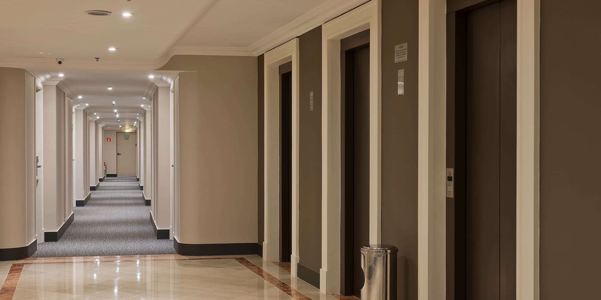 a hallway with several doors