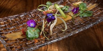a plate of food with flowers on it