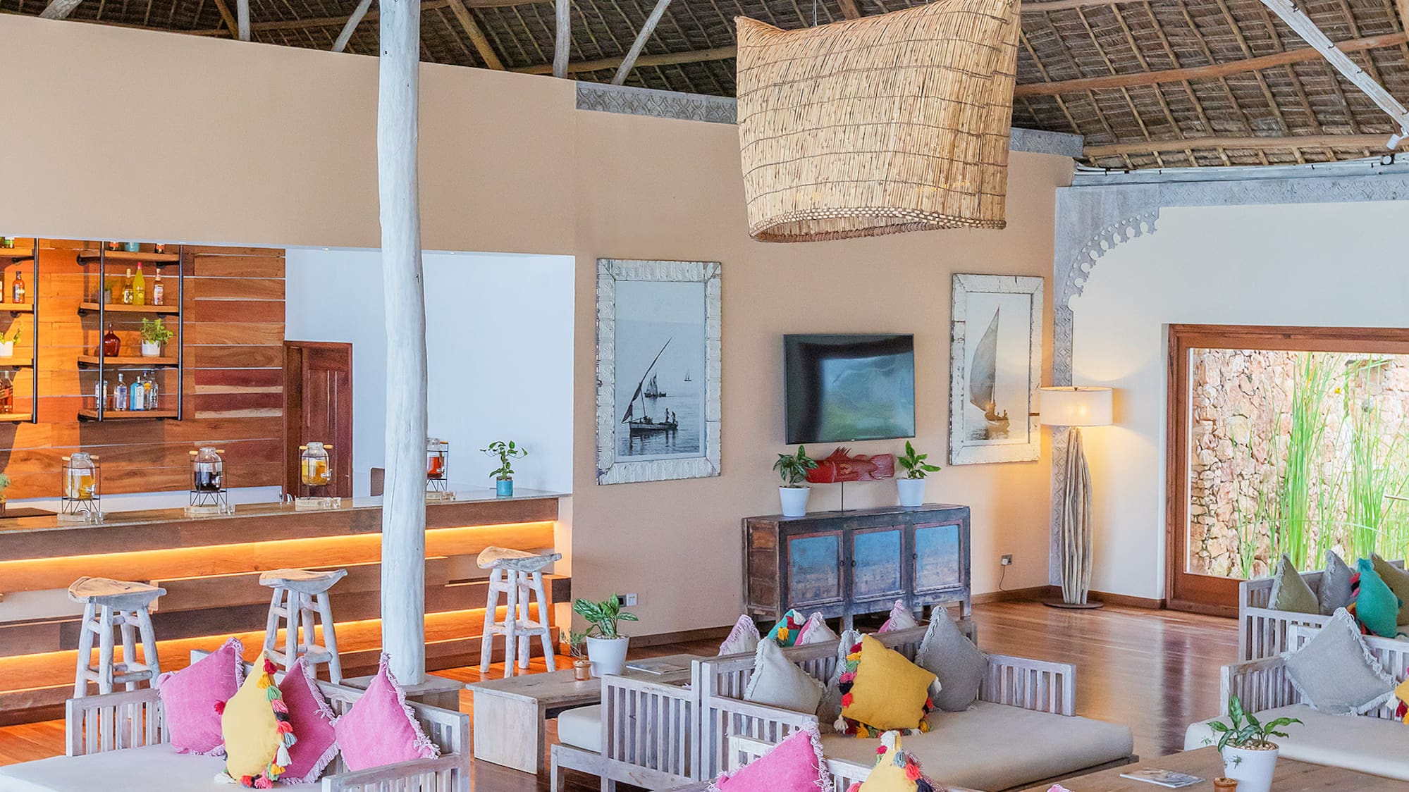 a room with white furniture and a large ceiling