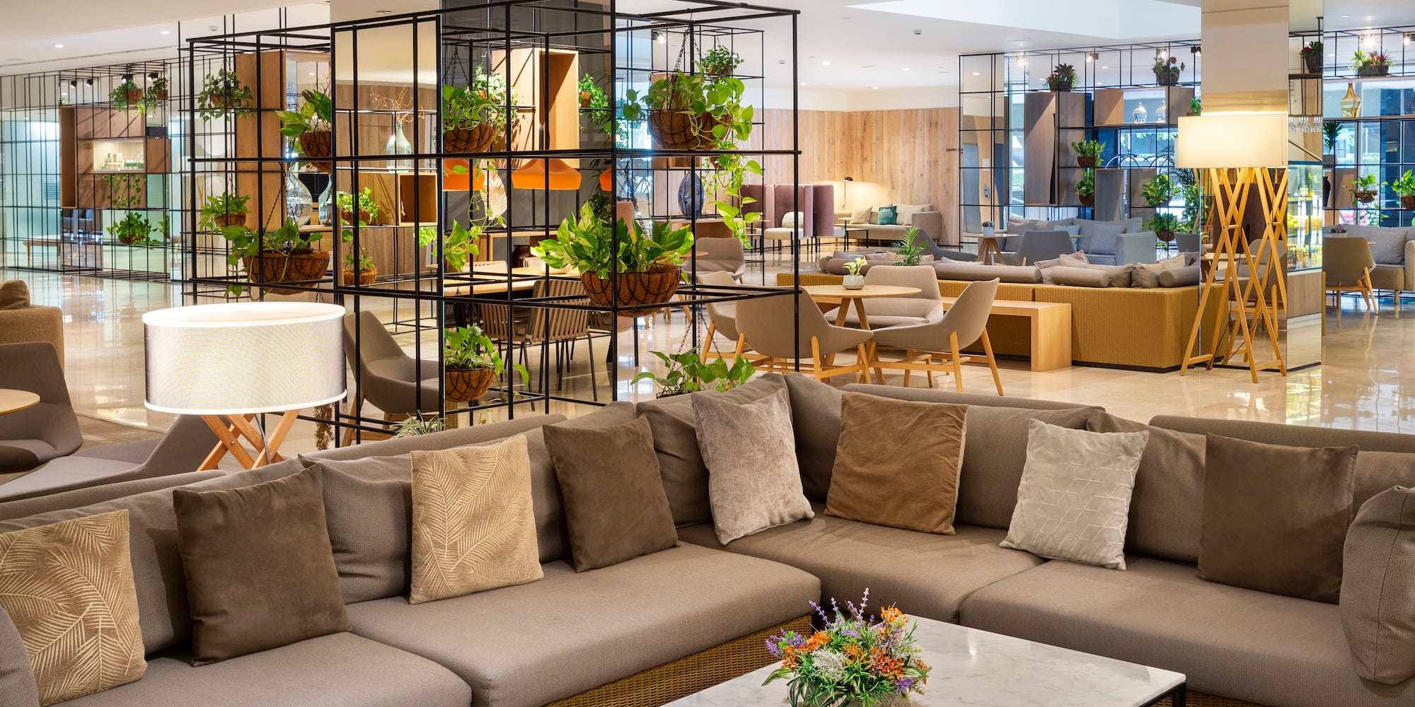 a room with a couch and tables