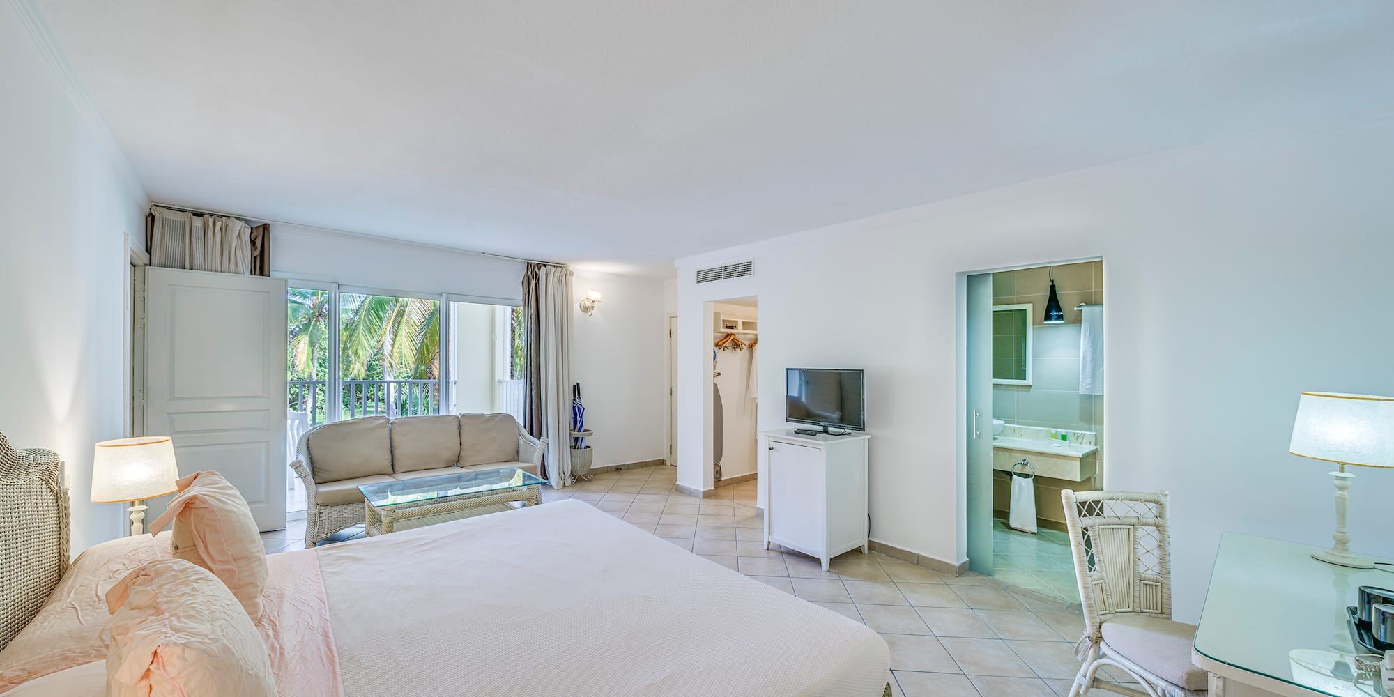 a room with a television and a bed