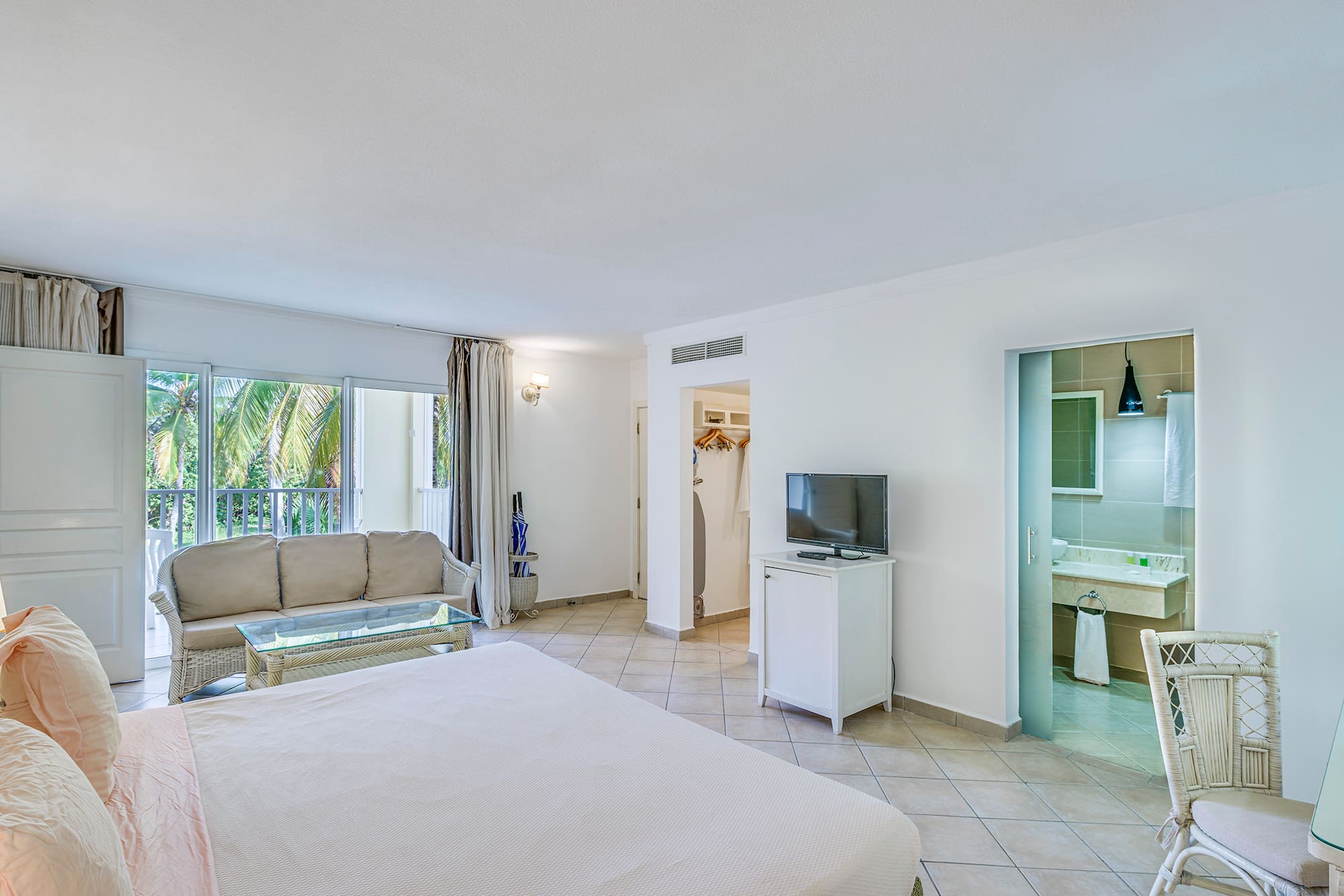 a room with a television and a bed