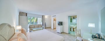 a room with a television and a bed